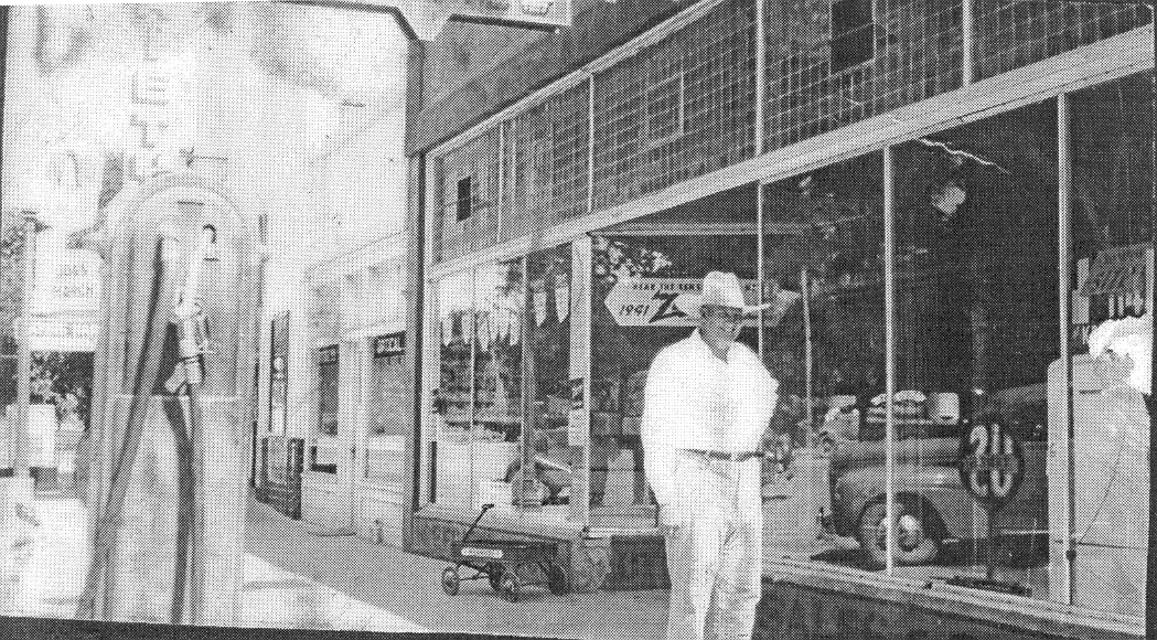 WCHS-01085 Melvin Cox and a gas pump in front of the Arrowhead store