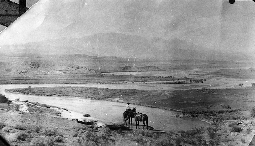 Man and two horses by the Virgin River