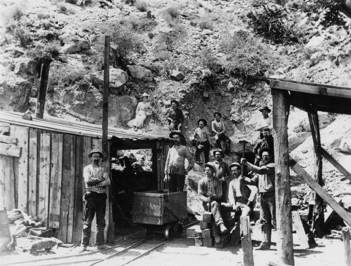 Miners at the entrance to the Apex Mine