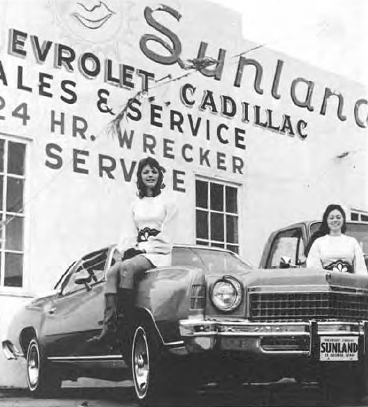 Girls and a car at Sunland Chevrolet & Cadillac