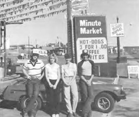 Young people in front of the Phillips 66 Minute Market