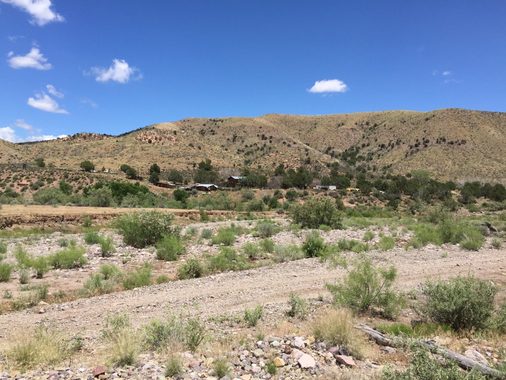 Terrain and a few homes at Motoqua, Utah
