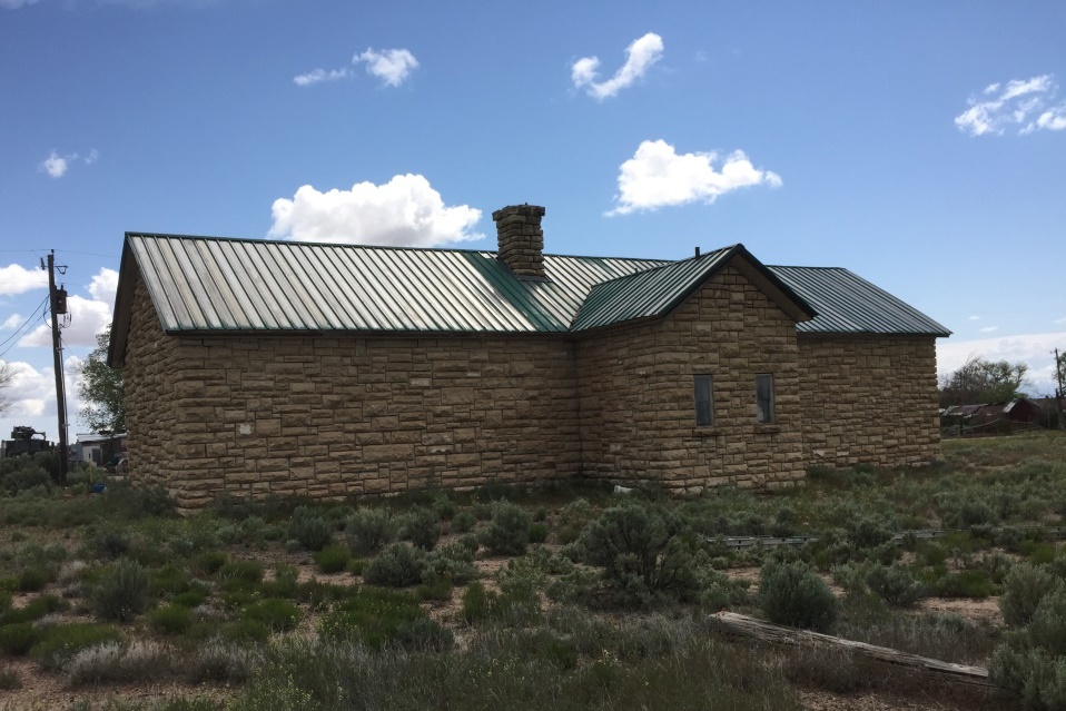 Back and side of the old school in Modena, Utah