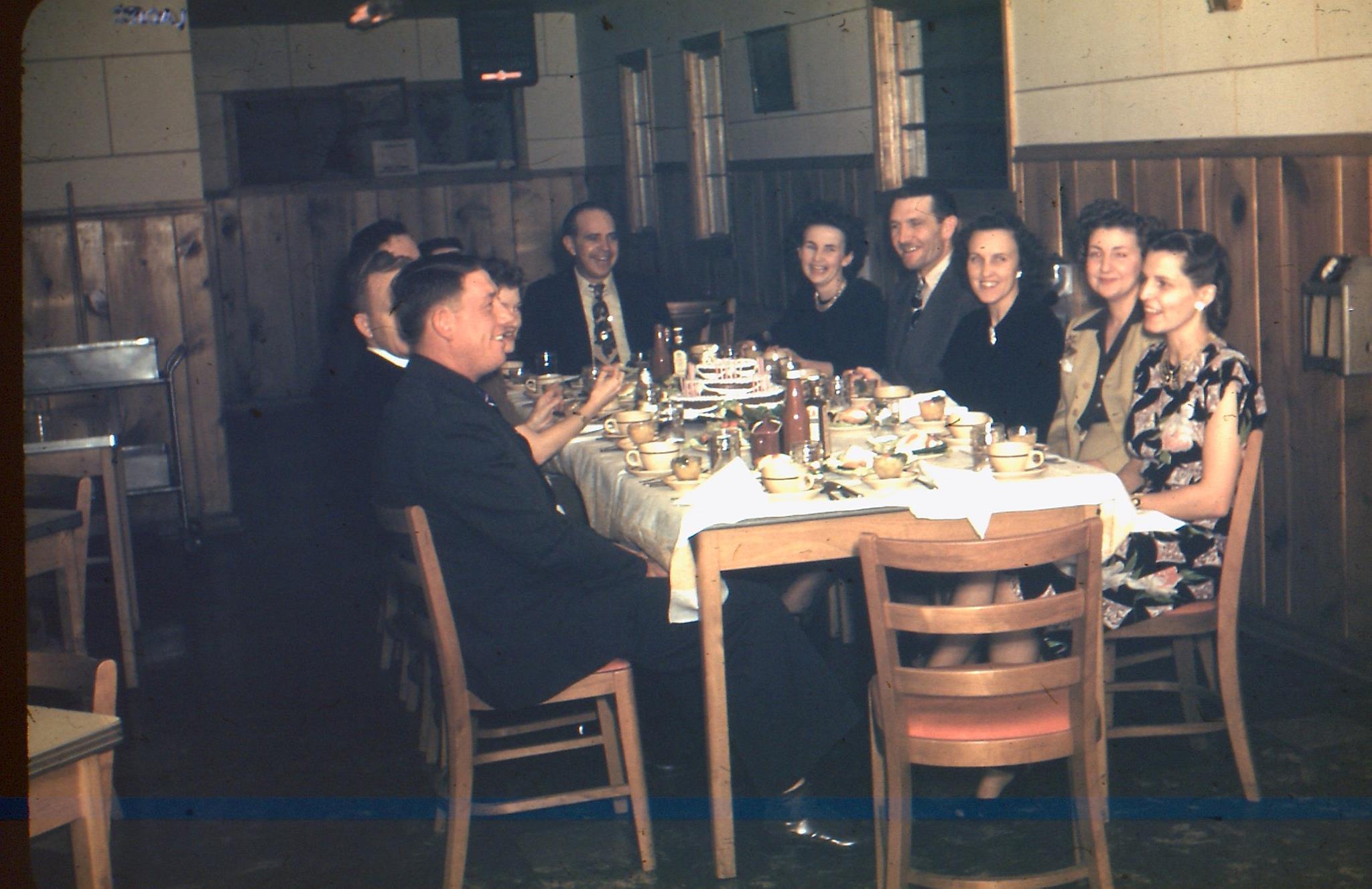 A group of people having dinner at Dick's Cafe