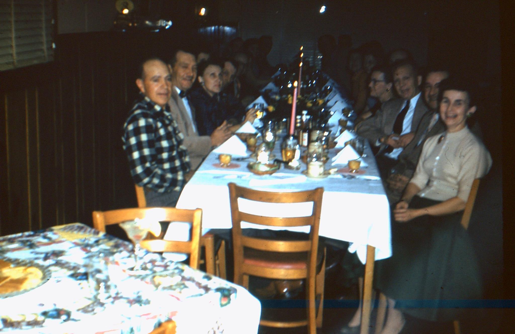 A group of people having dinner at Dick's Cafe