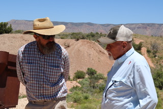 Greg Woodall and Milt Hokanson talking at the Grand Gulch Mine