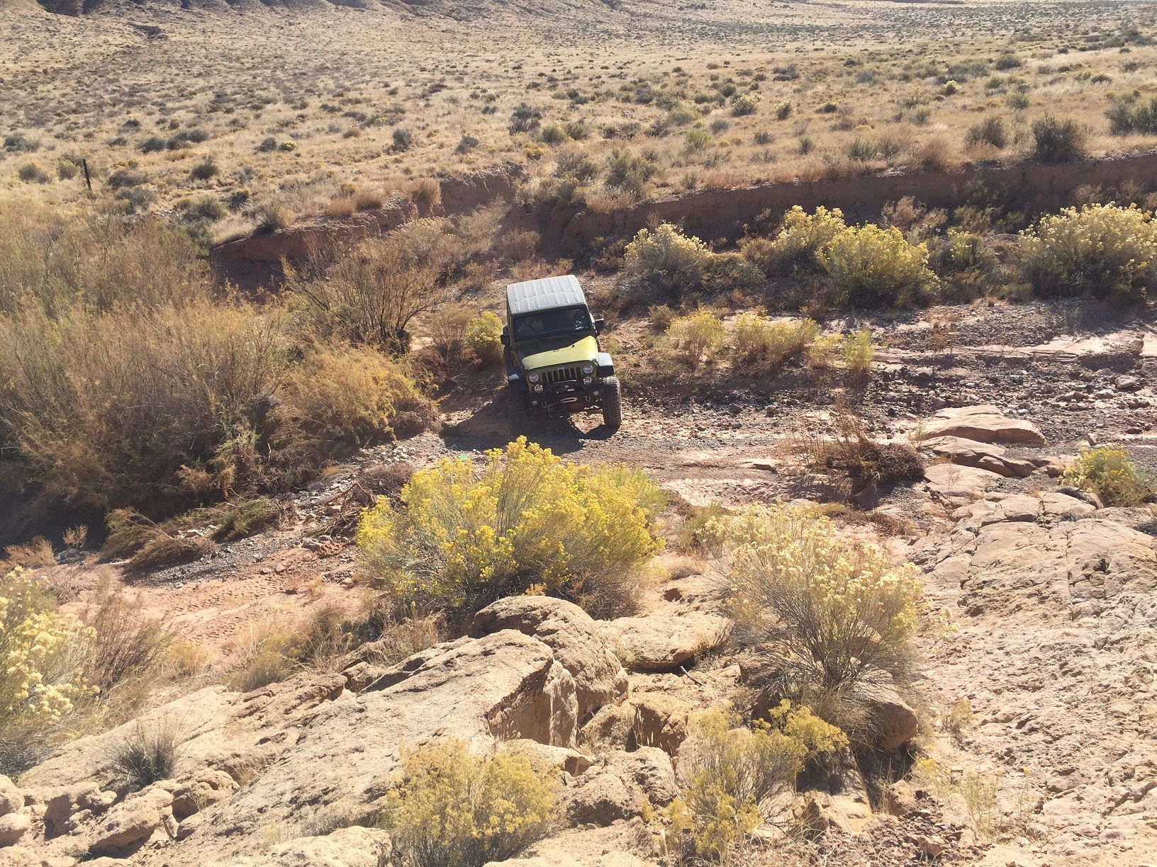 A Jeep crossing the Fort Pearce Wash where it intersects with the Temple Trail