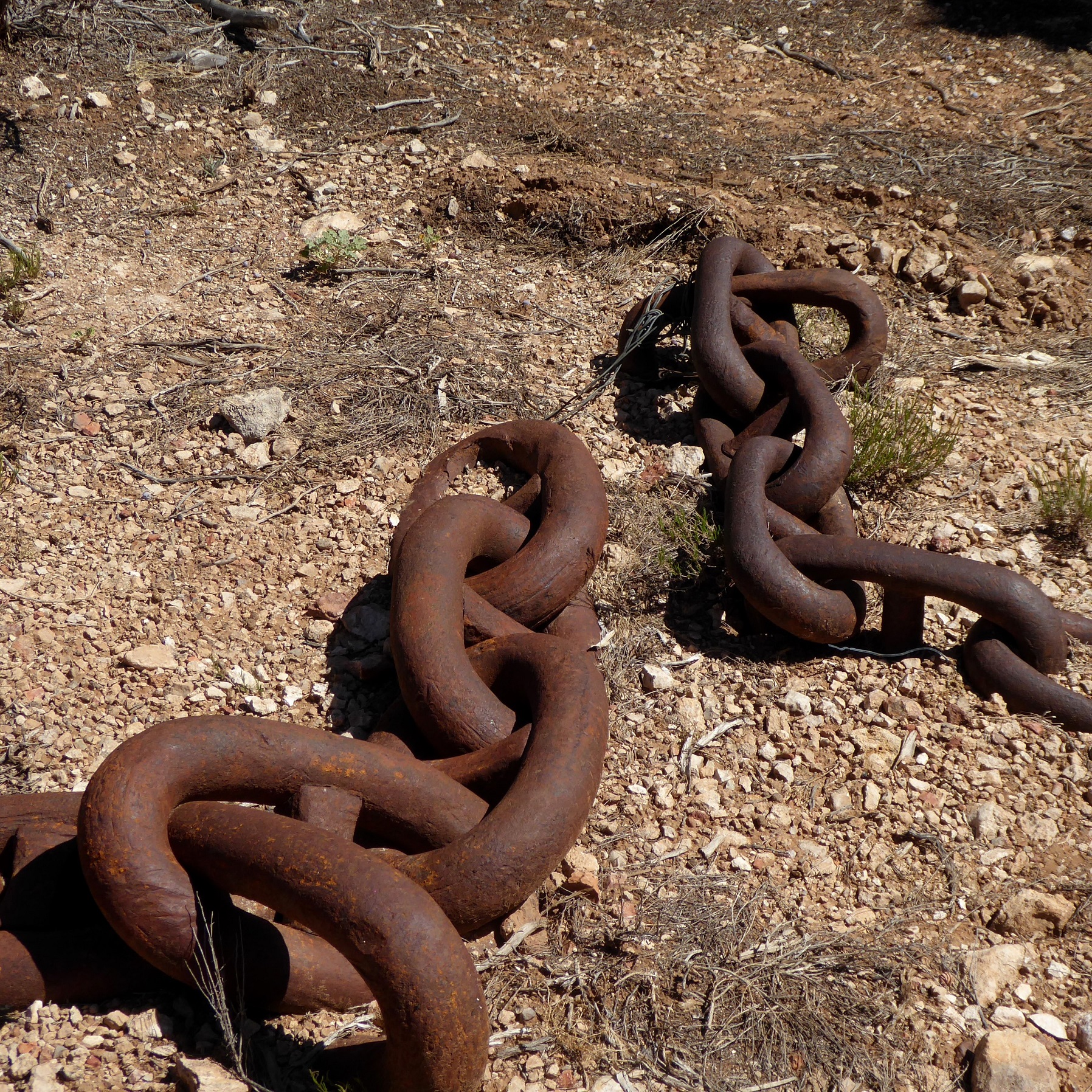 A segment of chain lining the parking area at the BLM Poverty Admin Site