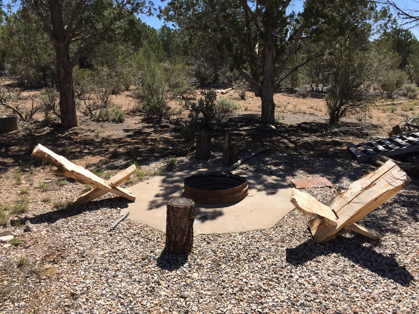A firepit and makeshift chairs at the BLM Poverty Admin Site