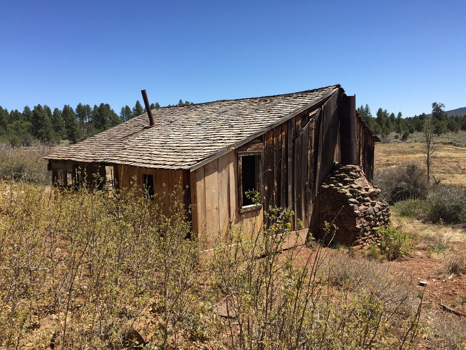The left and back sides of the Pine Cabin on the Arizona Strip