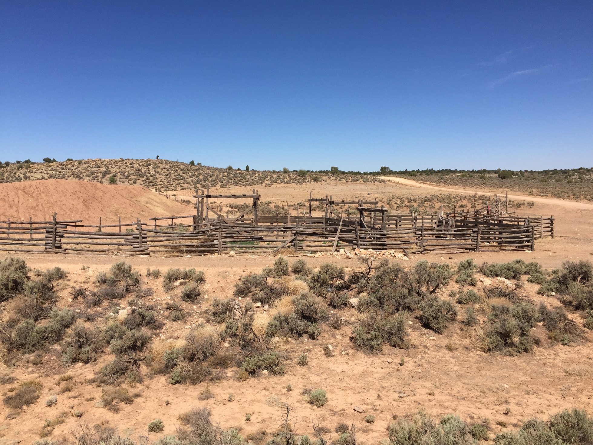 A corral and water retention pond on the Arizona Strip