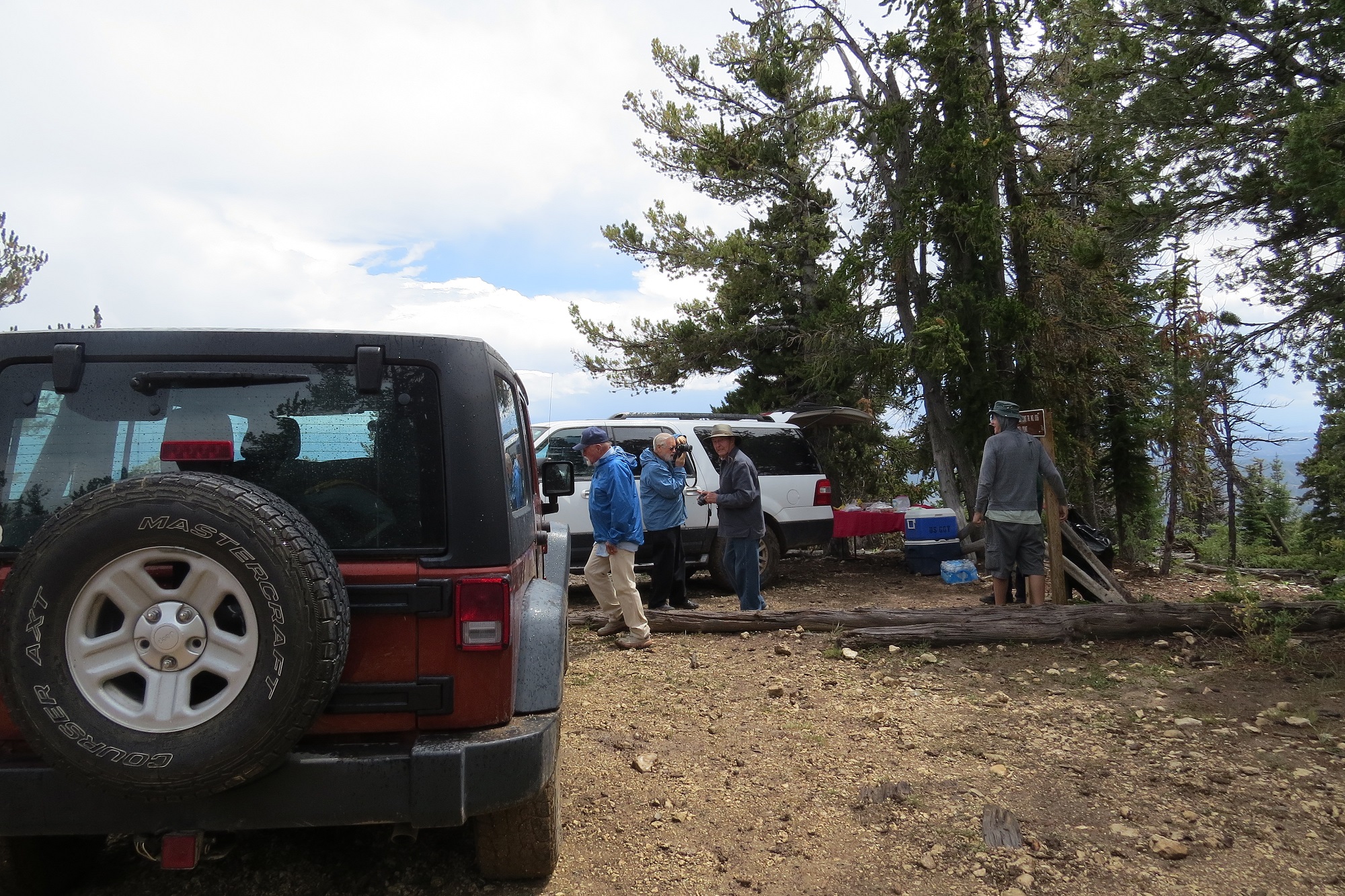 People gathered at the Powell Point trailhead