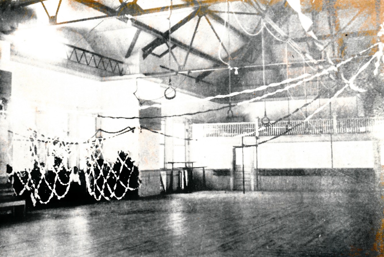 The Dixie Academy Buildiing Auditorium being decorated for a dance