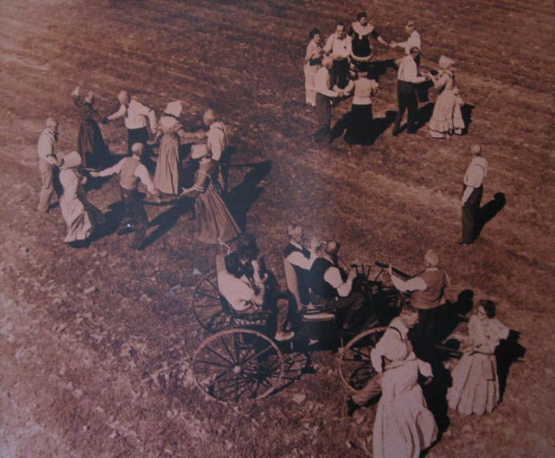 Pioneers Dancing in a Field