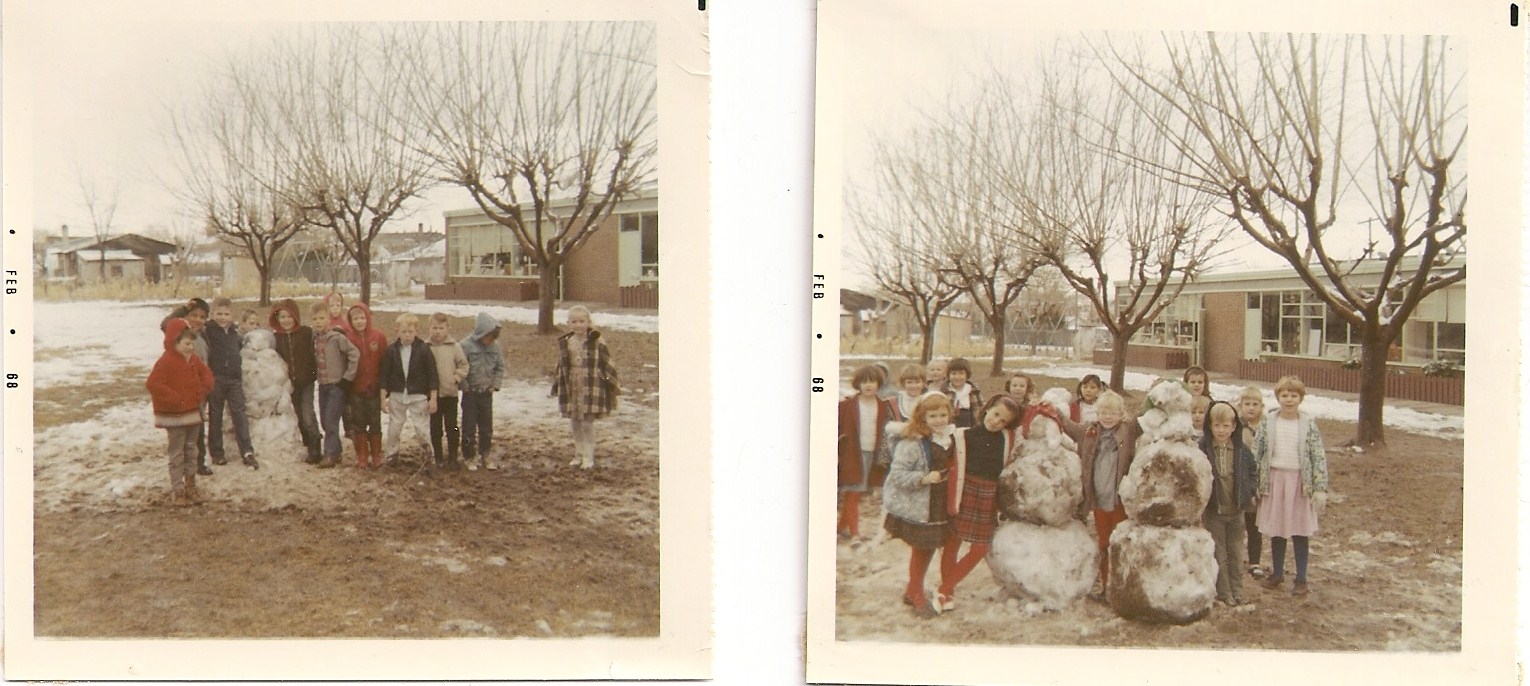 WCHS-00305 Kids with snowmen on the West Elementary School playground