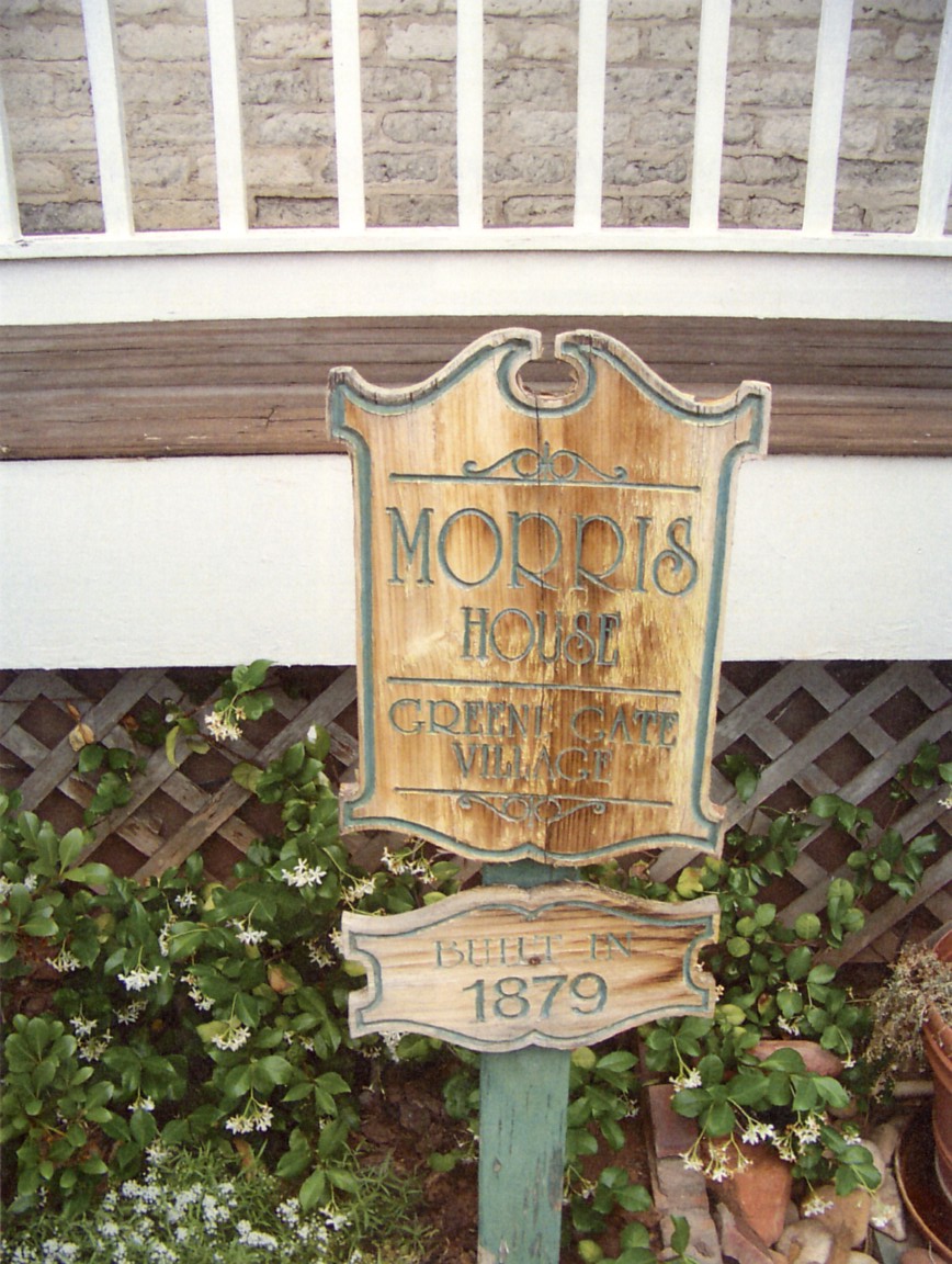 Wood sign in front of the Richard A. Morris Home