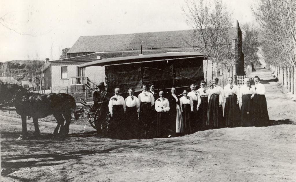 WCHS-01128 Group of temple workers with the horse drawn wagon used to transport them