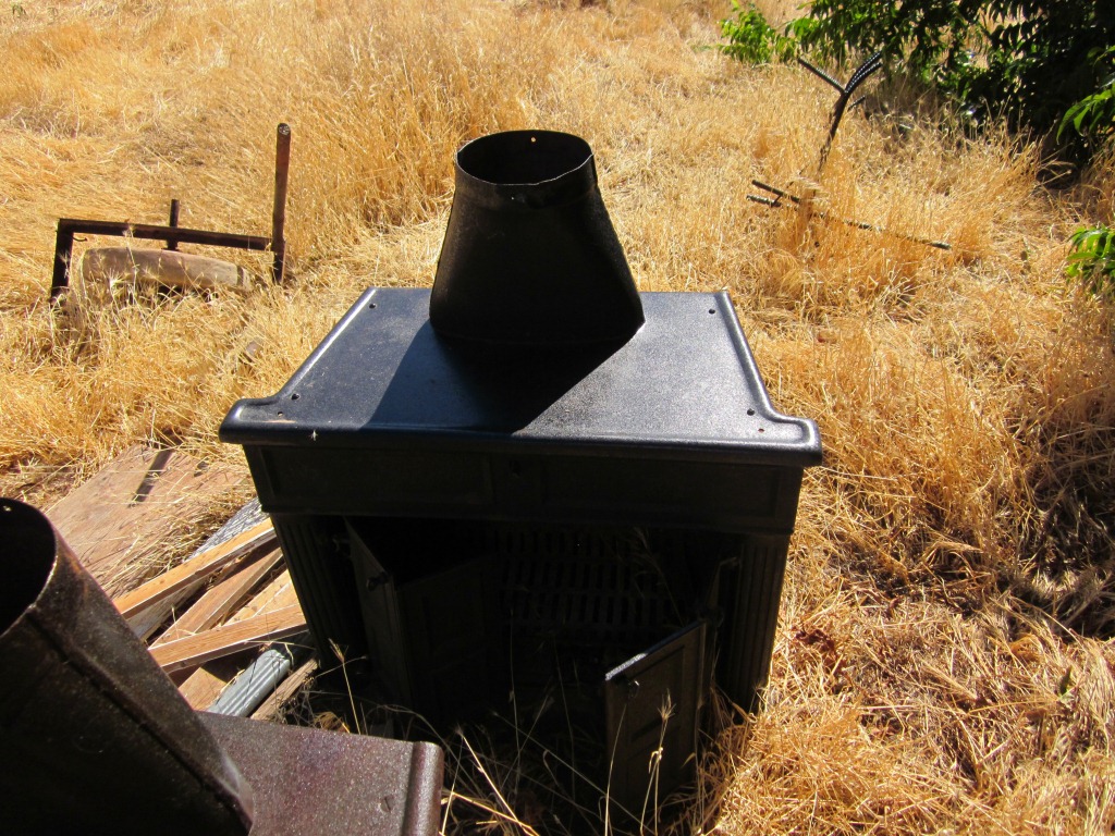 Discarded stove in the yard of the John Stucki home