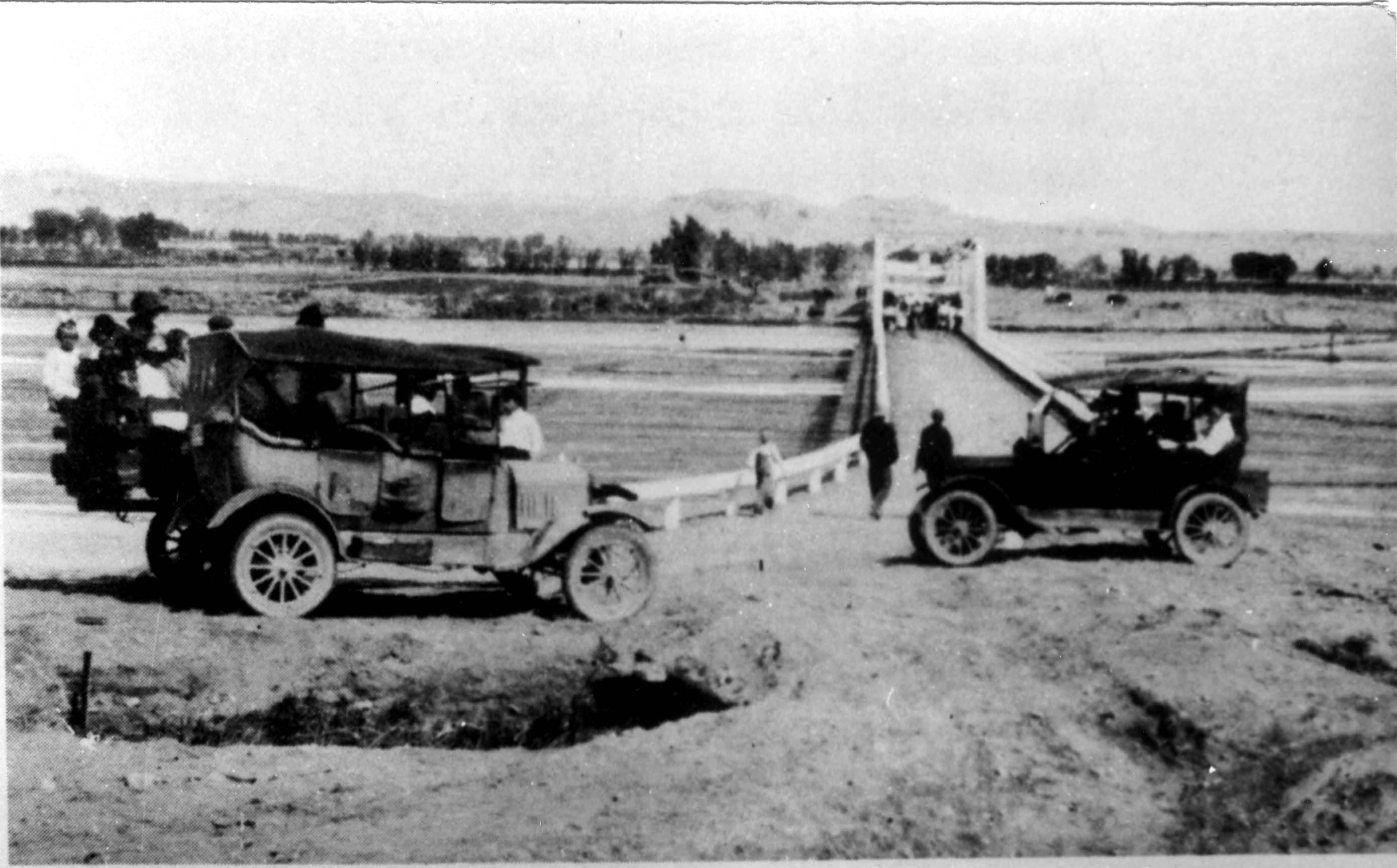 Two cars ready to cross the new Virgin River Bridge in 1921