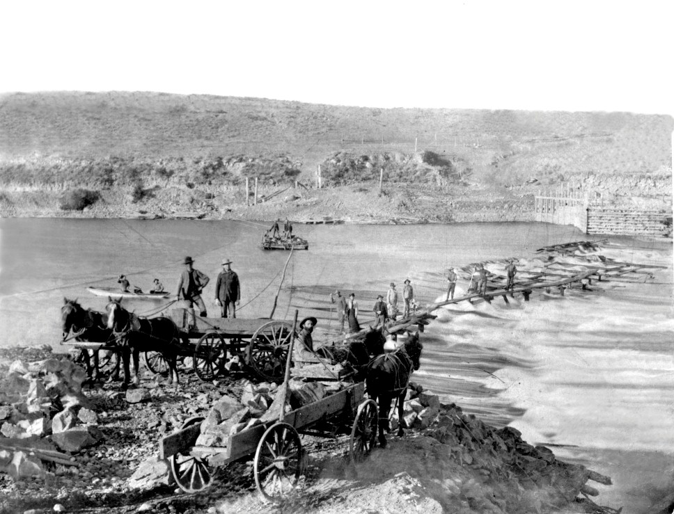 Men working on the spillway of the Washington Field Dam