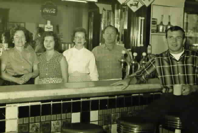 People at the counter of Rex's Fountain
