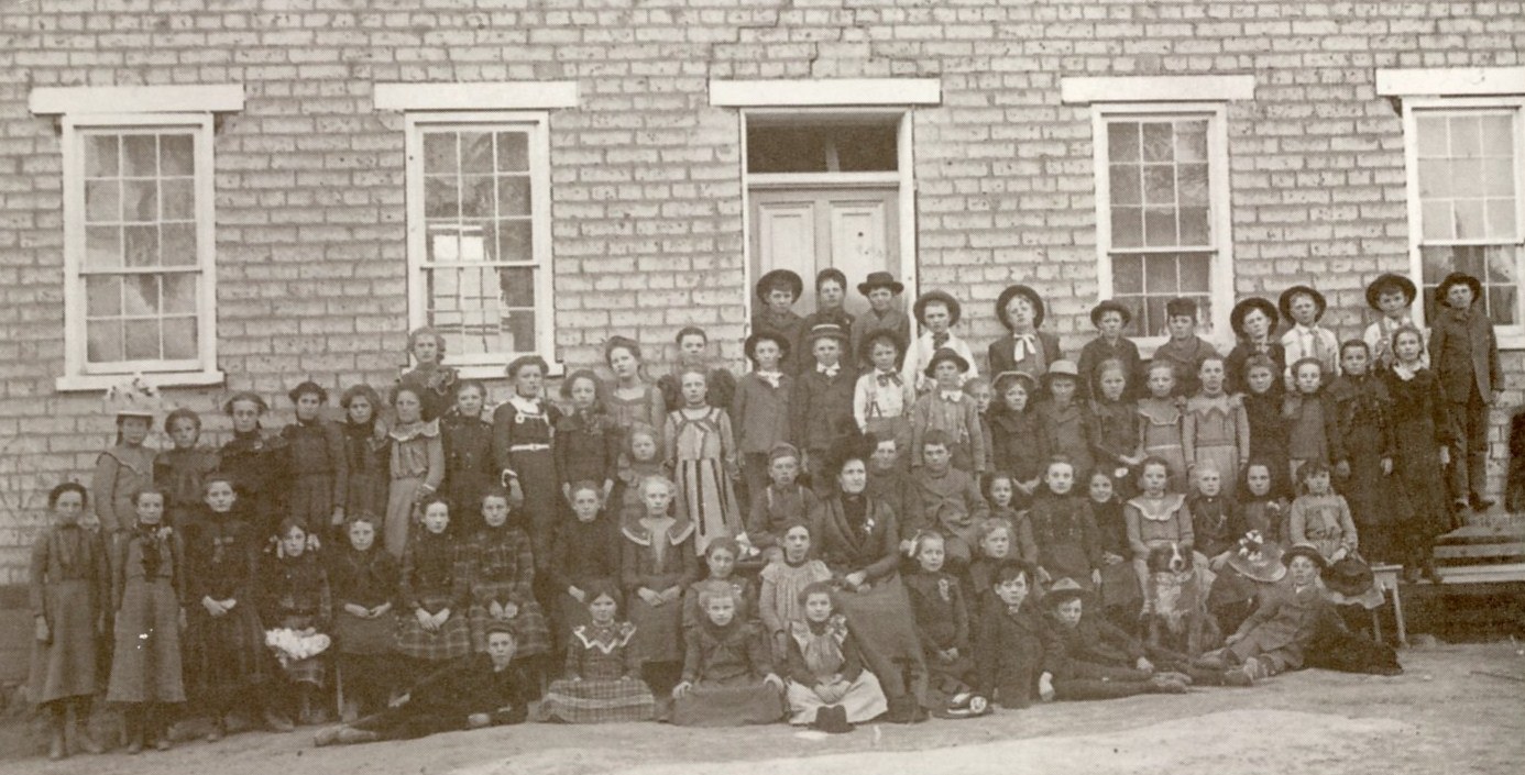 People in front of the St. George First Ward Schoolhouse