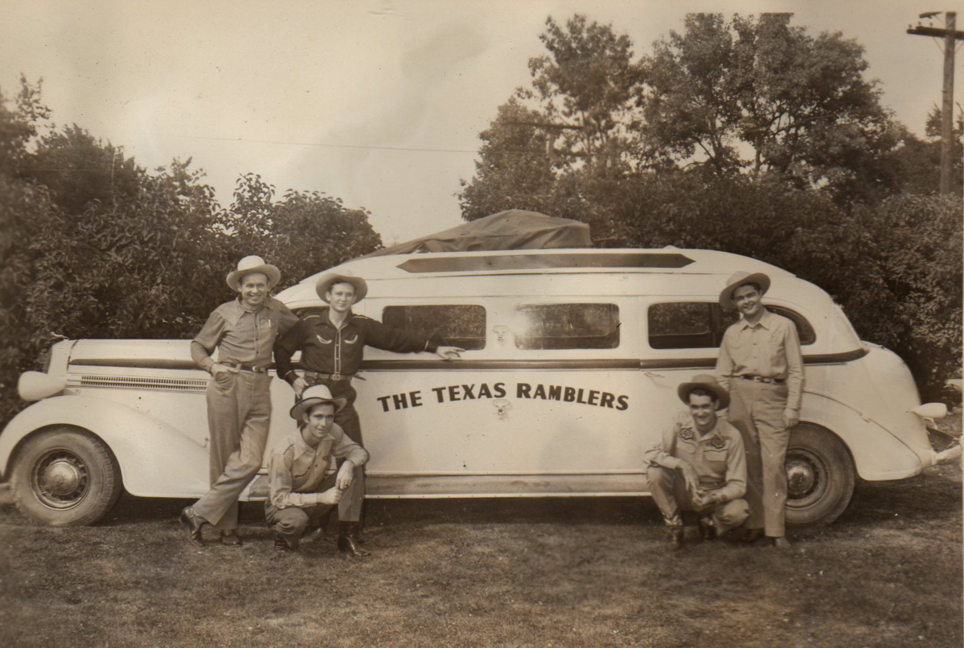 The Texas Ramblers with their car