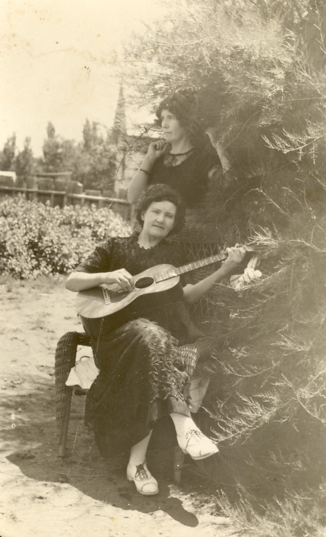 Margaret Burgess with a guitar and Jennie Burgess