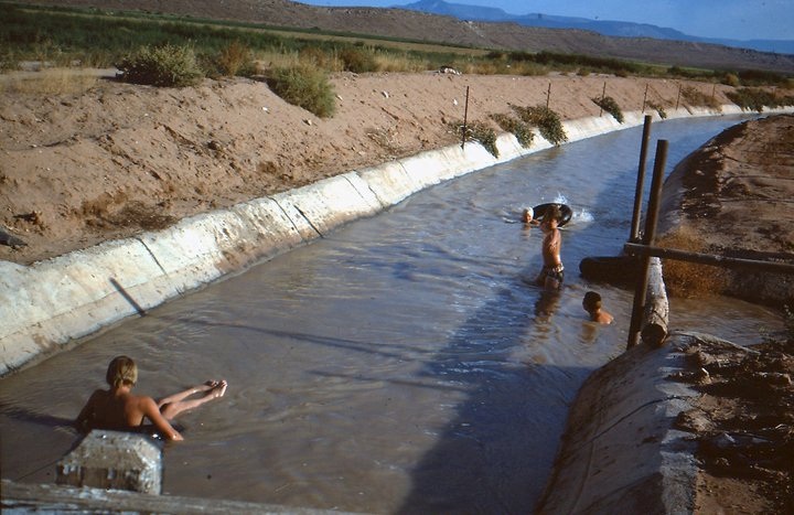 Children playing in the Washington Fields Canal