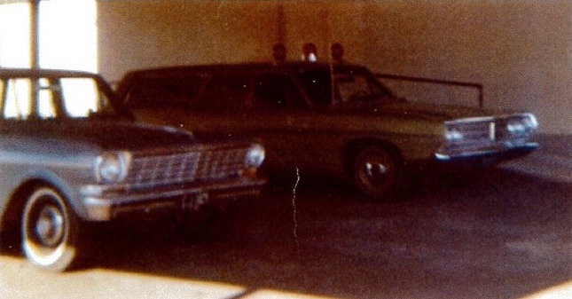 Early 1970s ambulance and another car