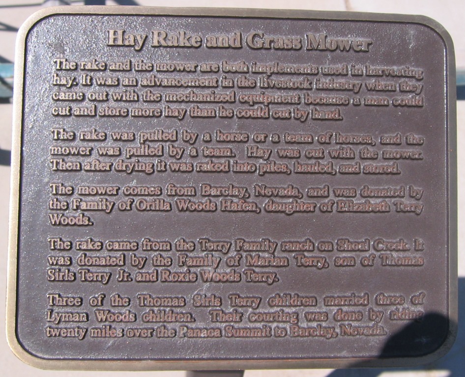 'Hay Rake and Grass Mower' descriptive plaque at the Terry Heritage Park