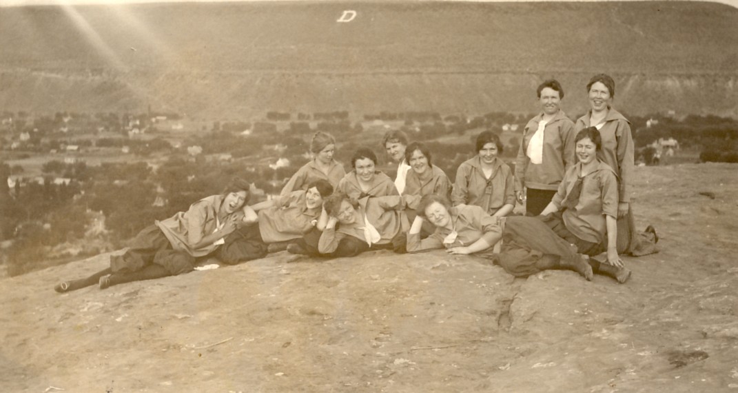 Group of women on the Sugarloaf with the 'D' in the background