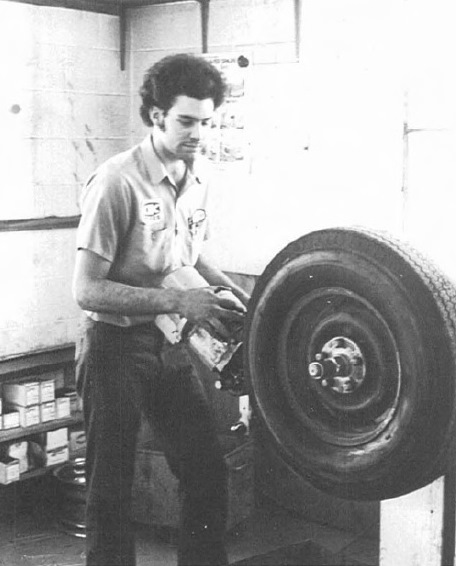 Technician working on a tire at the OK Tire Store