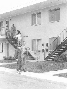 Students in front of the Benson Apartments