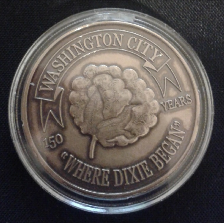 Front of the Washington City 150th year commemorative coin