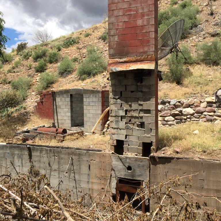 The basement and one of the chimneys of the old bunkhouse at the DI Ranch