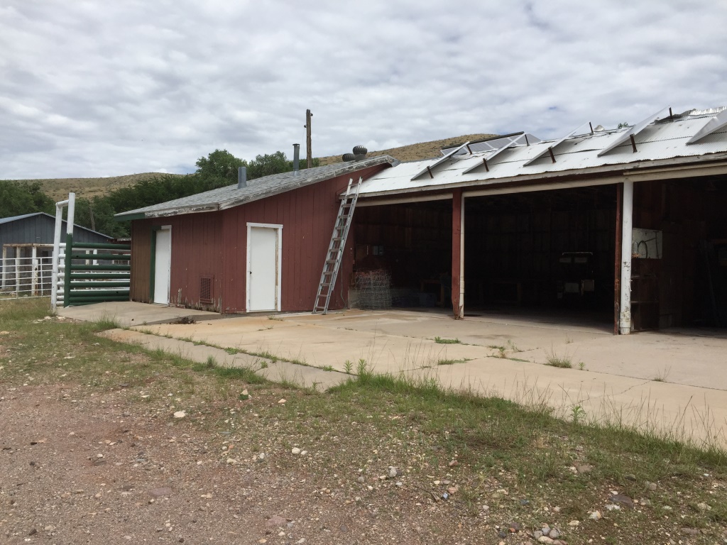 A garage or barn building and a storage building at the DI Ranch