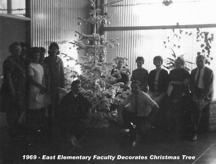 The 1969-1970 faculty by the East Elementary School Christmas tree