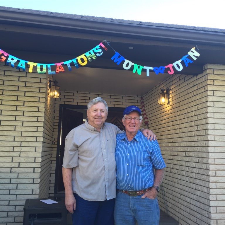 Mont Burton and Stan Esplin celebrating Mont's wedding