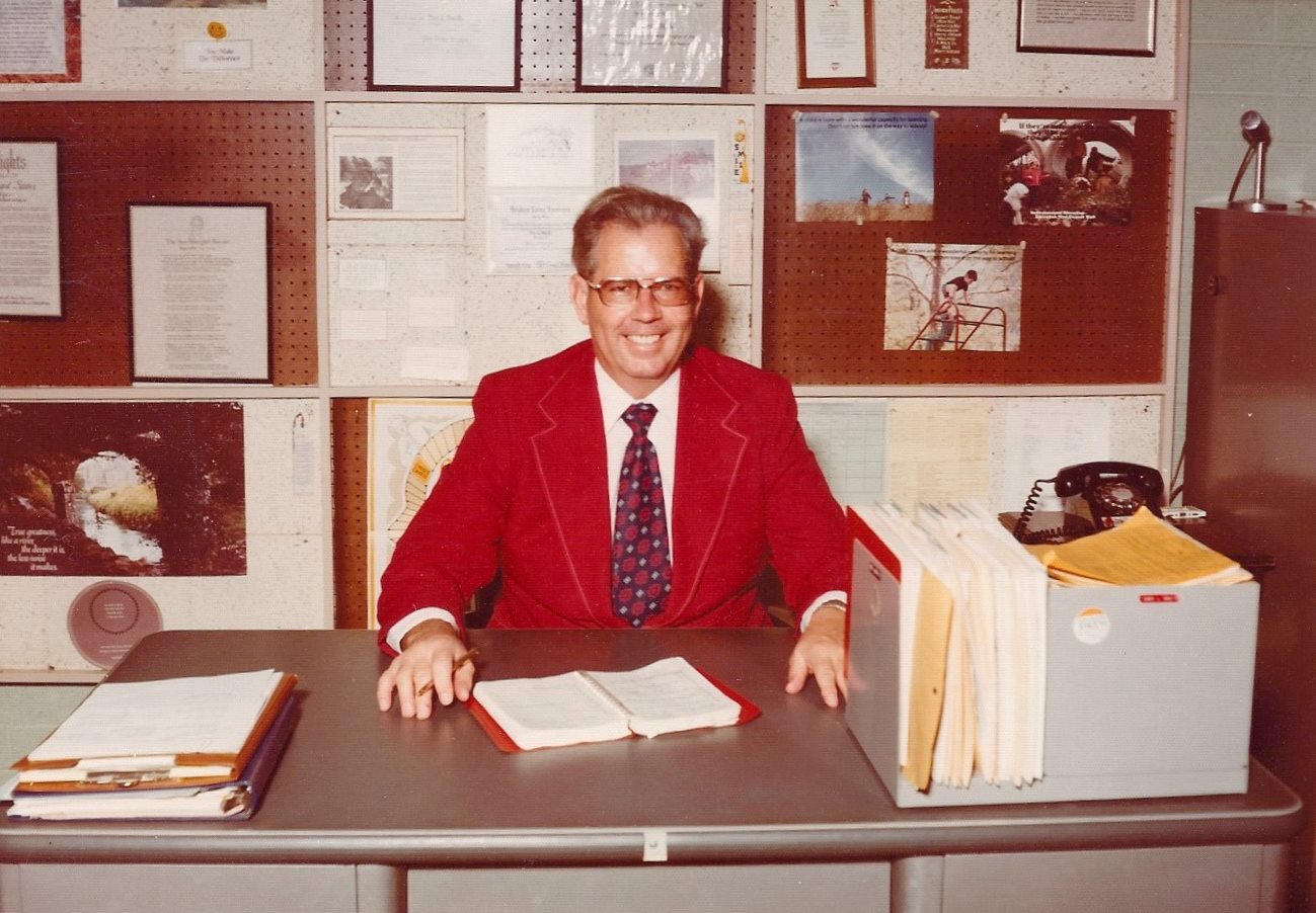 Principal Dar L. Smith at his desk at East Elementary Schoool