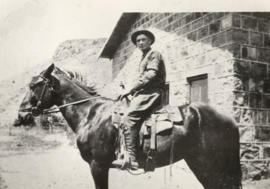 W. Vaughn Jones on a horse in front of the Veyo Power Plant #2