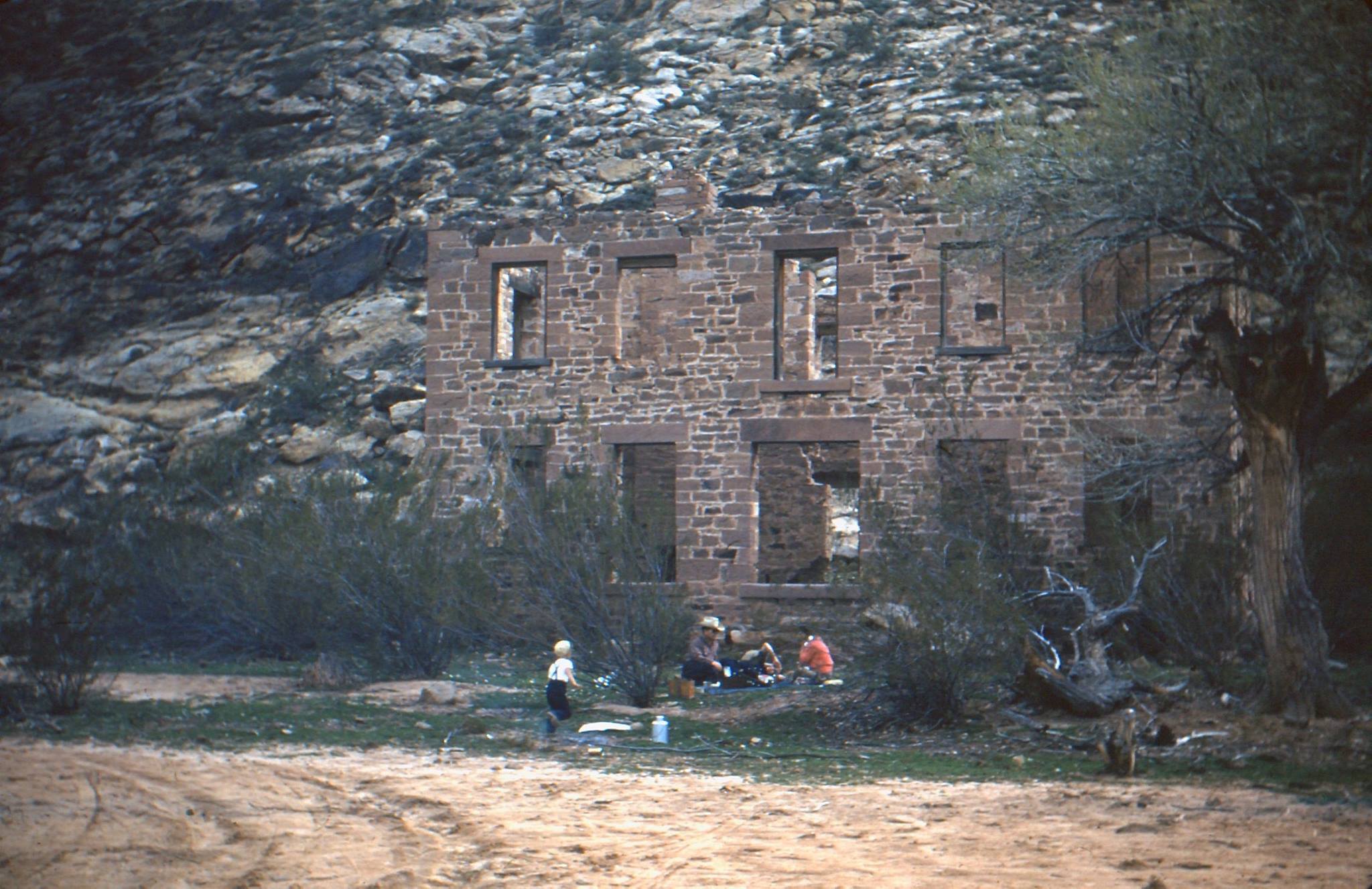 people in front of the old building at Camp Lorenzo