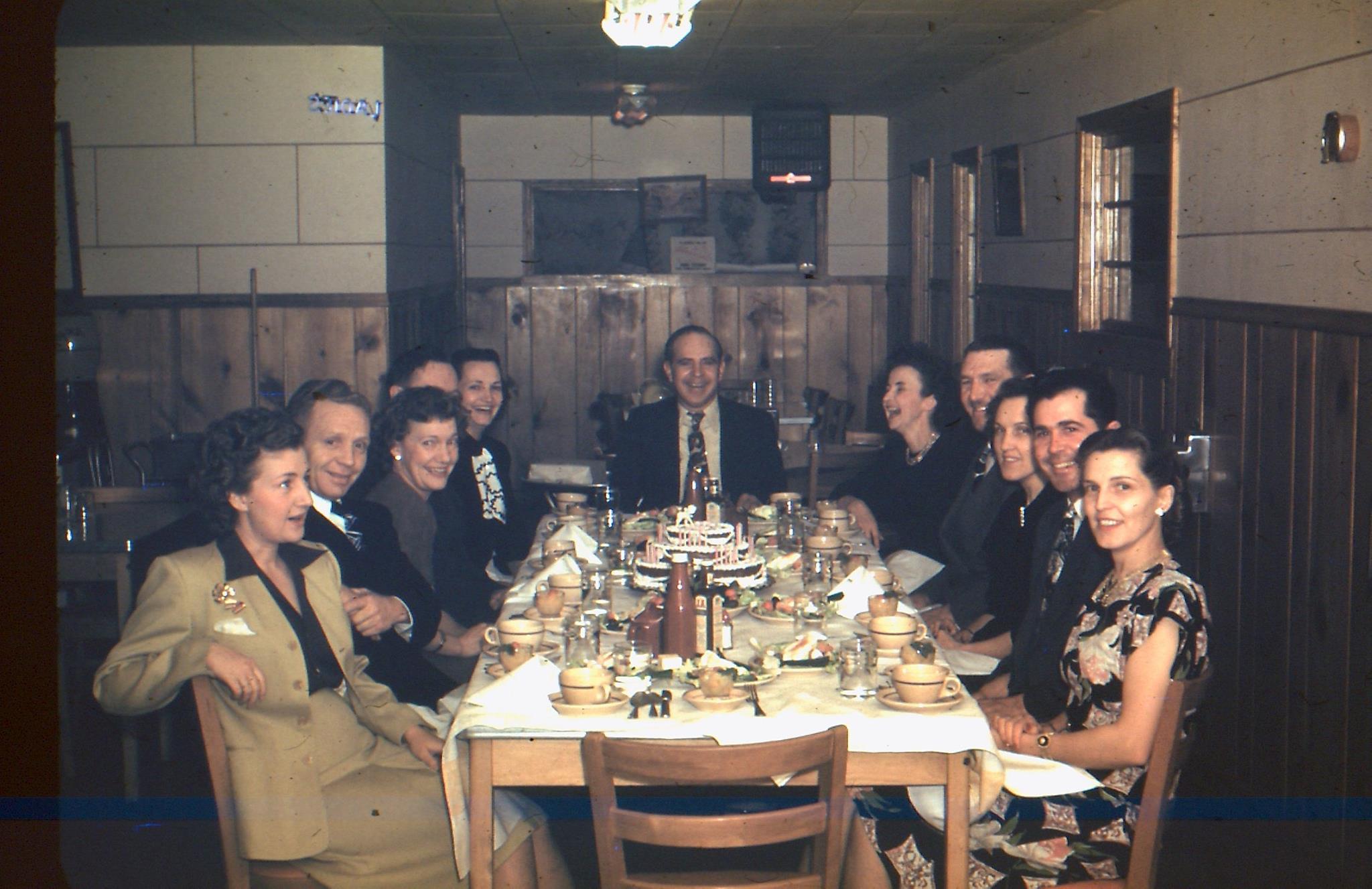 A group of people having dinner at Dick's Cafe
