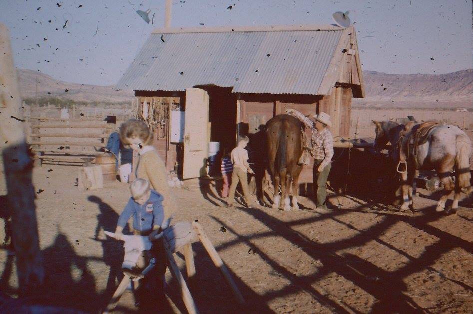 Iliff Andrus with some family members at the tach shed on the Andrus Farm