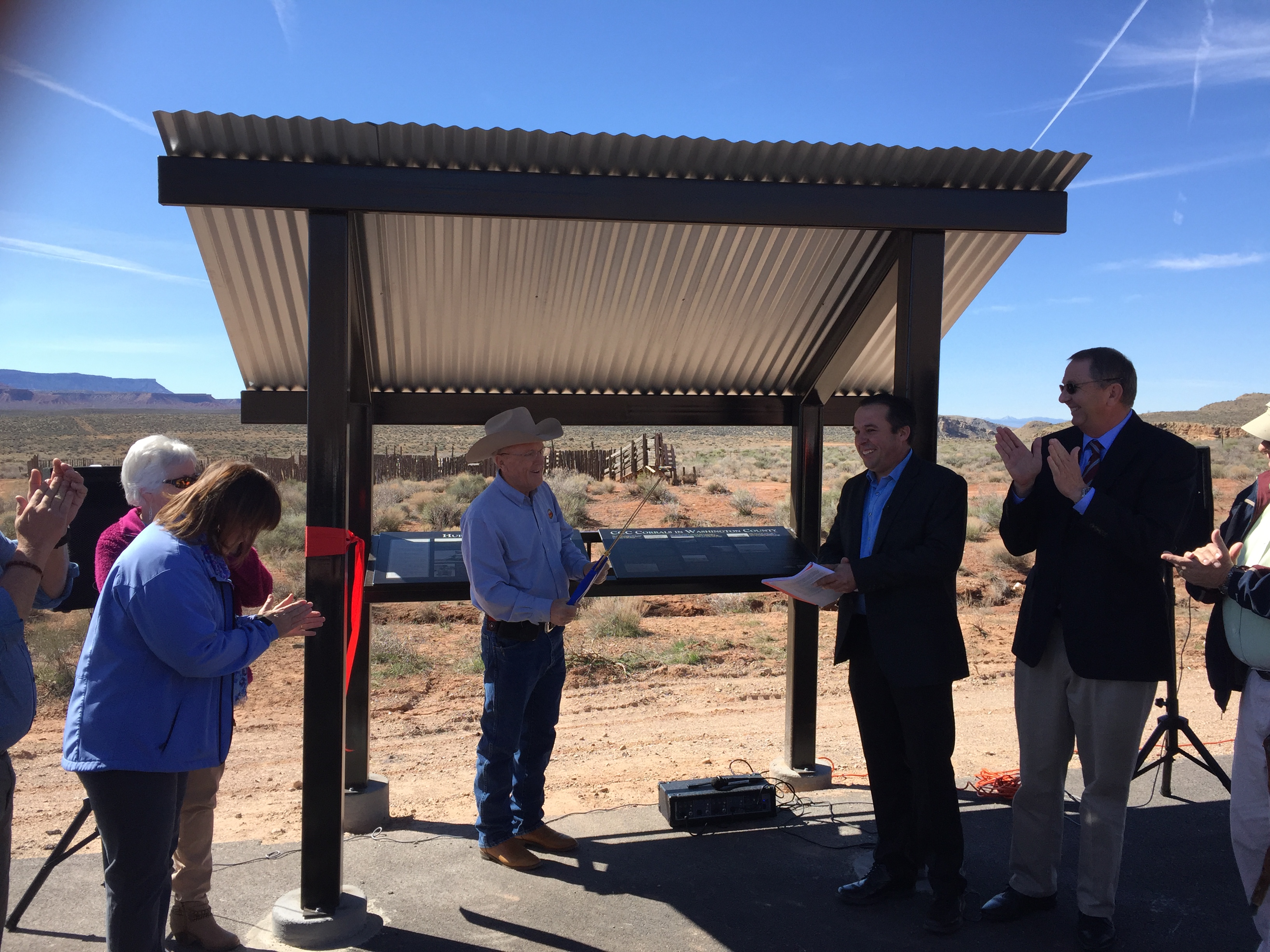 Alan Gardner speaking at the ribbon cutting of a new informational kiosk