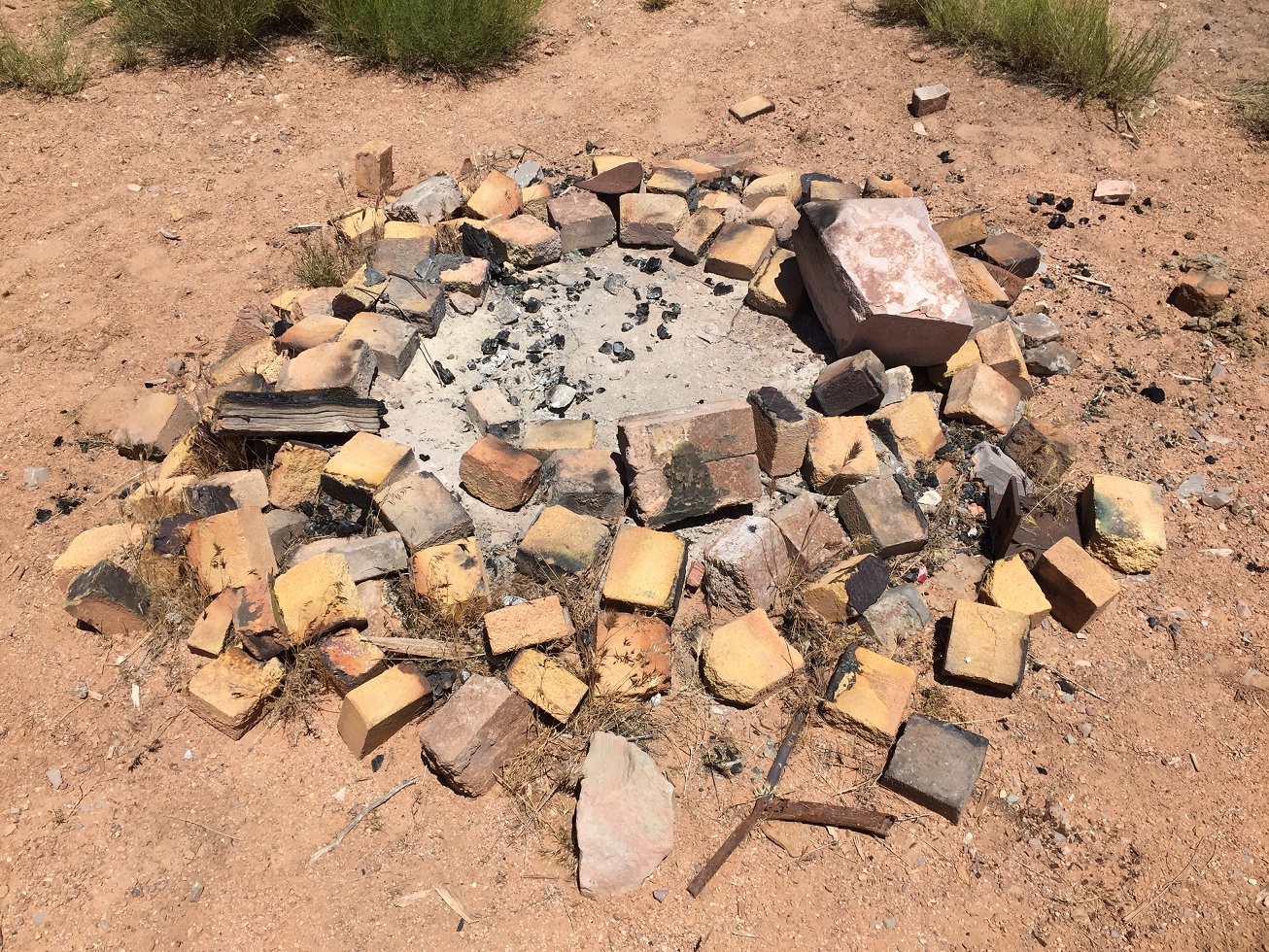 Firepit made from bricks out of the old furnace at the Grand Gulch Mine