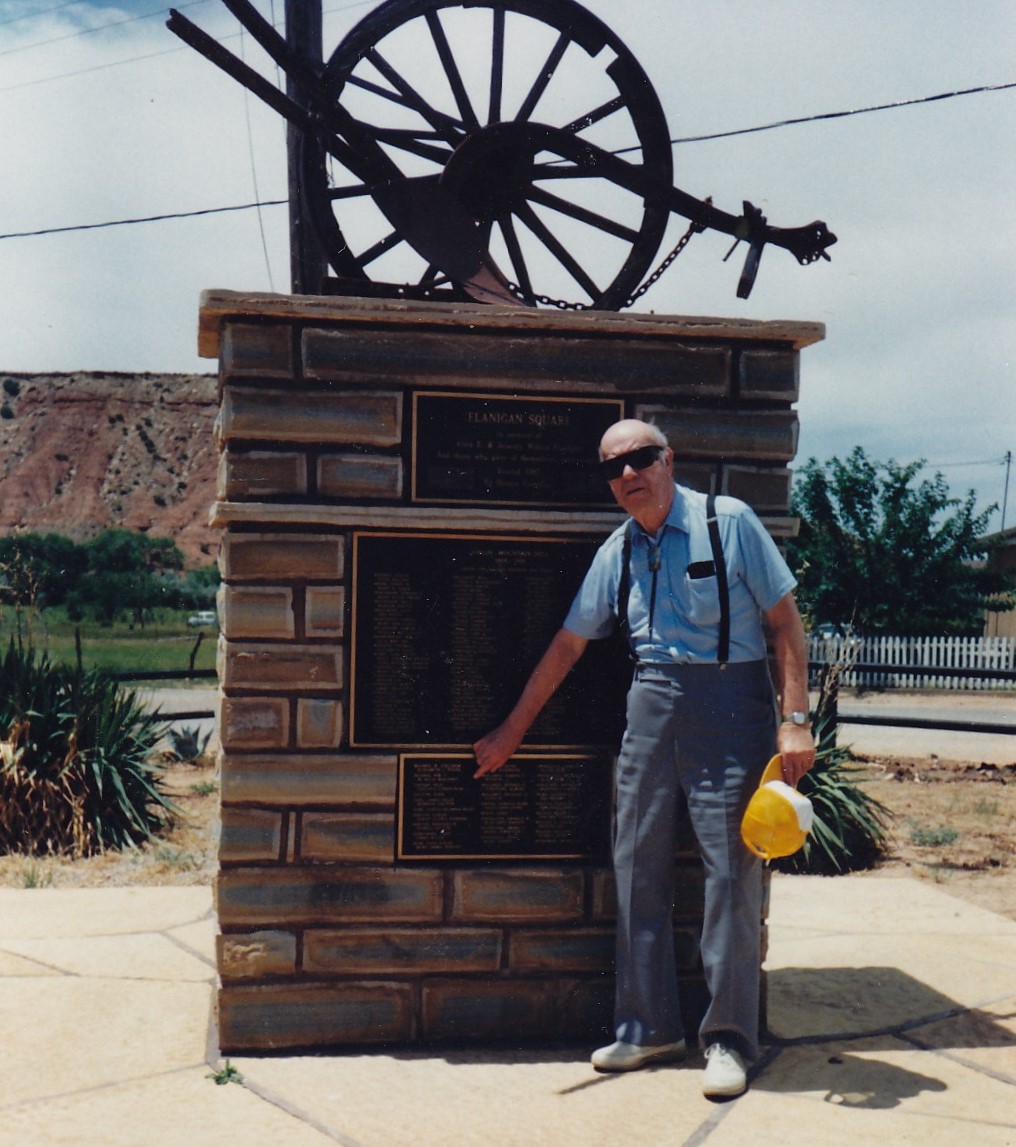 Lem Ward pointing out the names of his ancestors on a Virgin, Utah monument