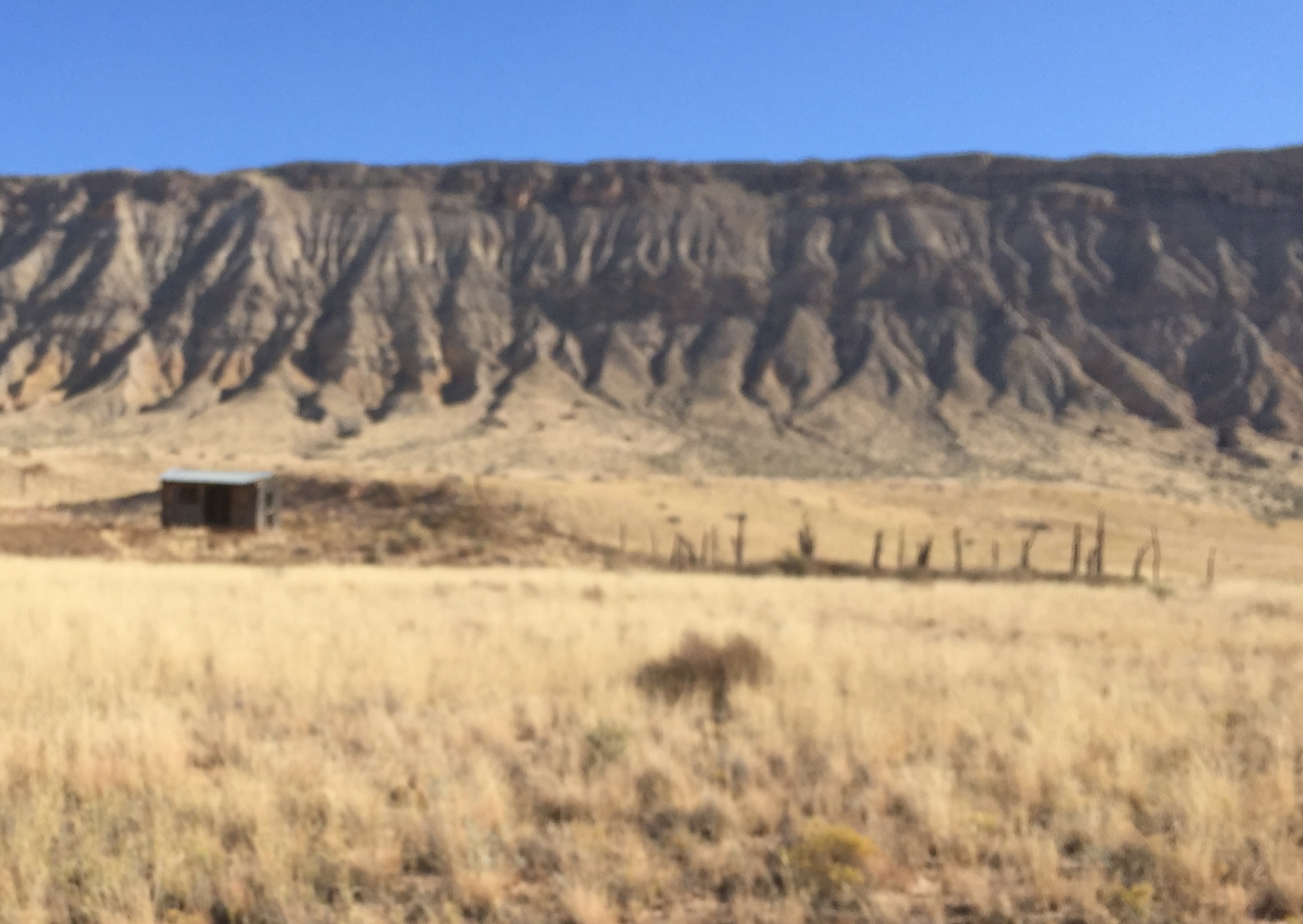 An unidentified cabin and corral on the east side of the Temple Trail