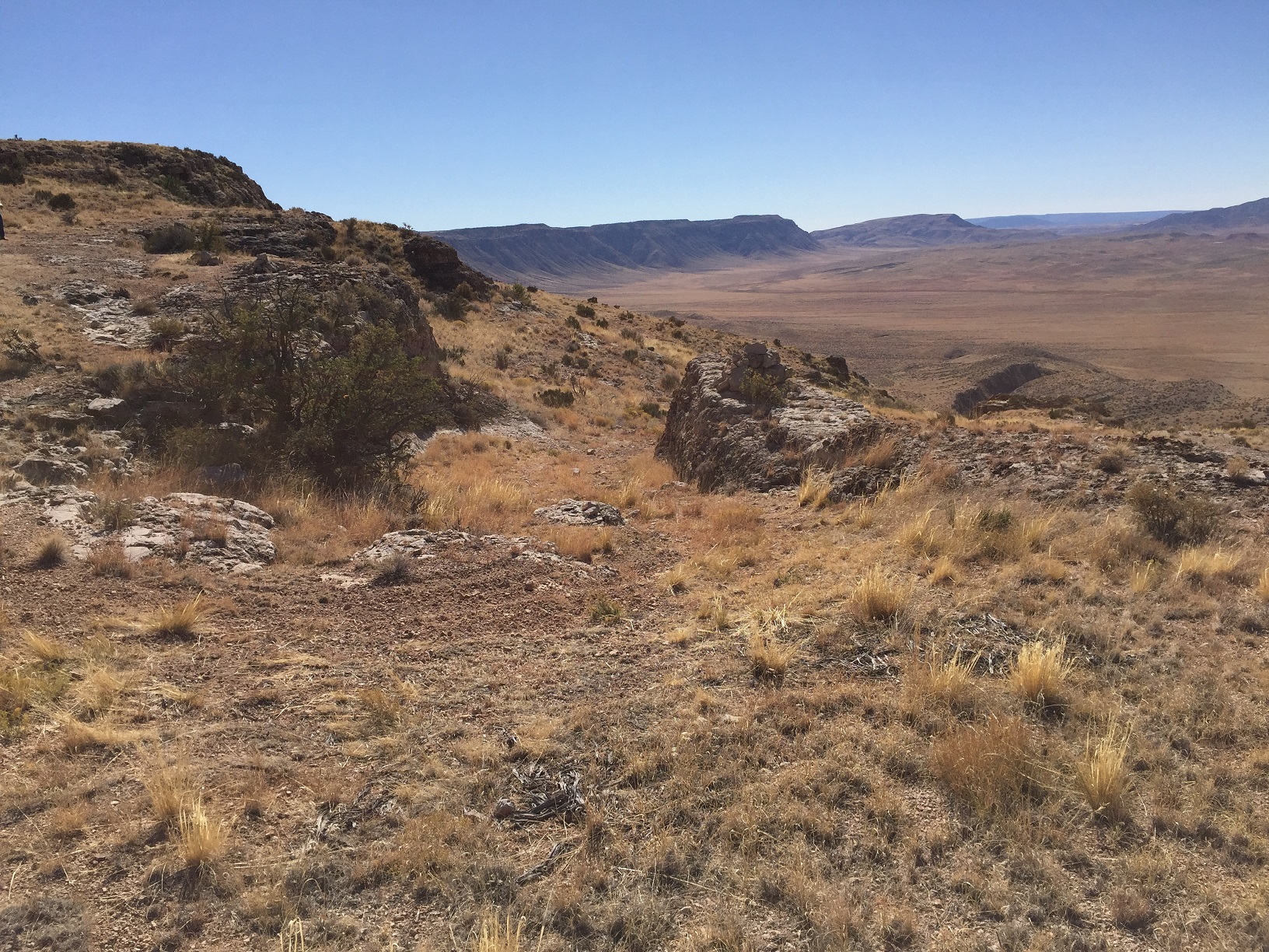 Temple Trail starting down off of the Hurricane Cliffs through a dugway cut through a rock