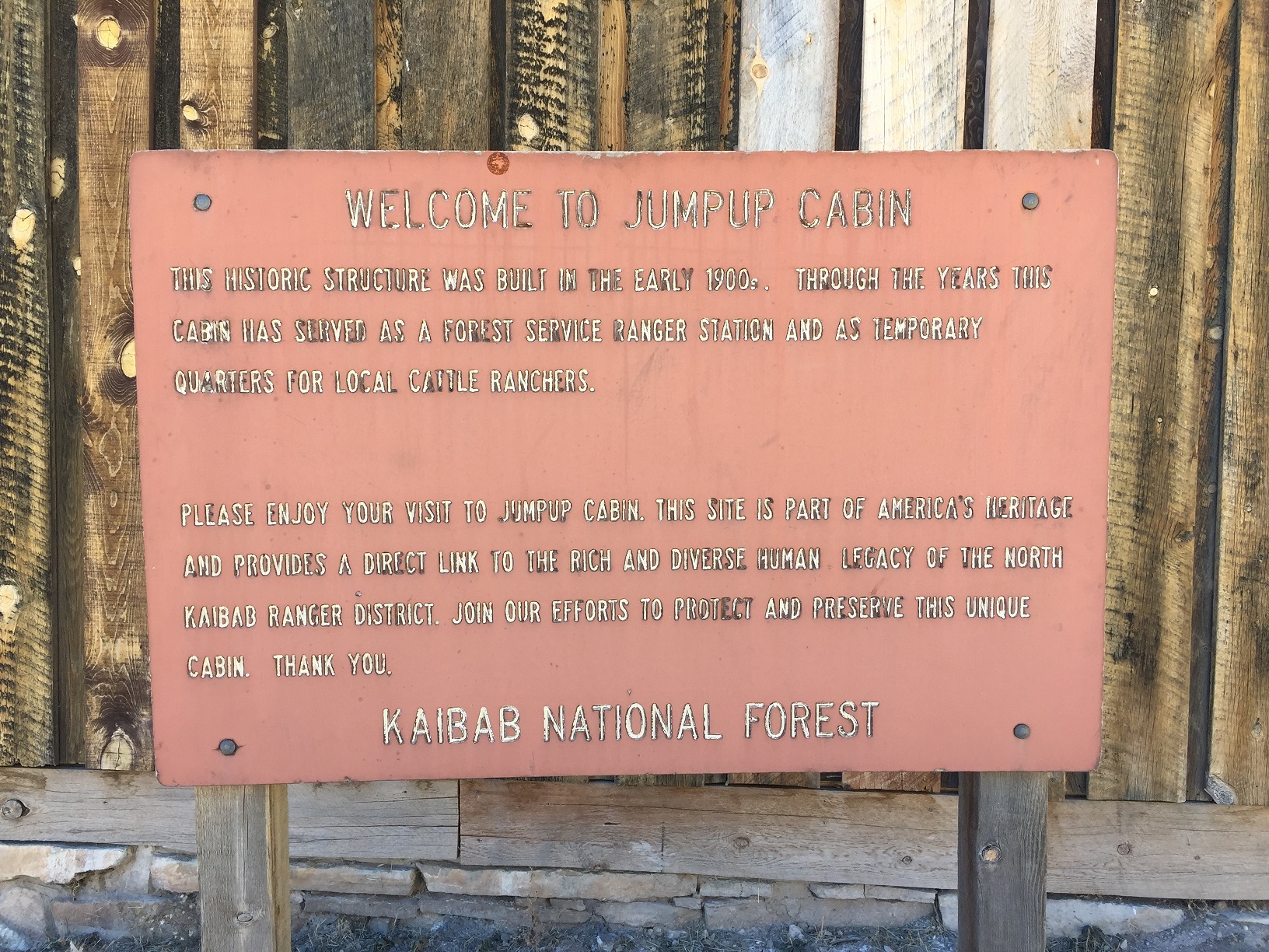 An interpretive sign on the Jump Up Cabin